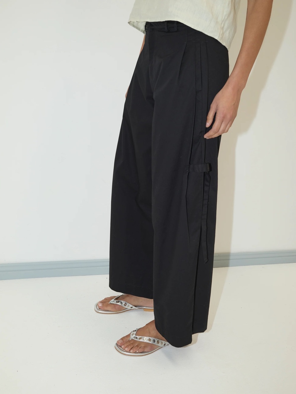 Deiji Studios Mid-Rise Black Wide-Leg Trousers with Side Strap Detail